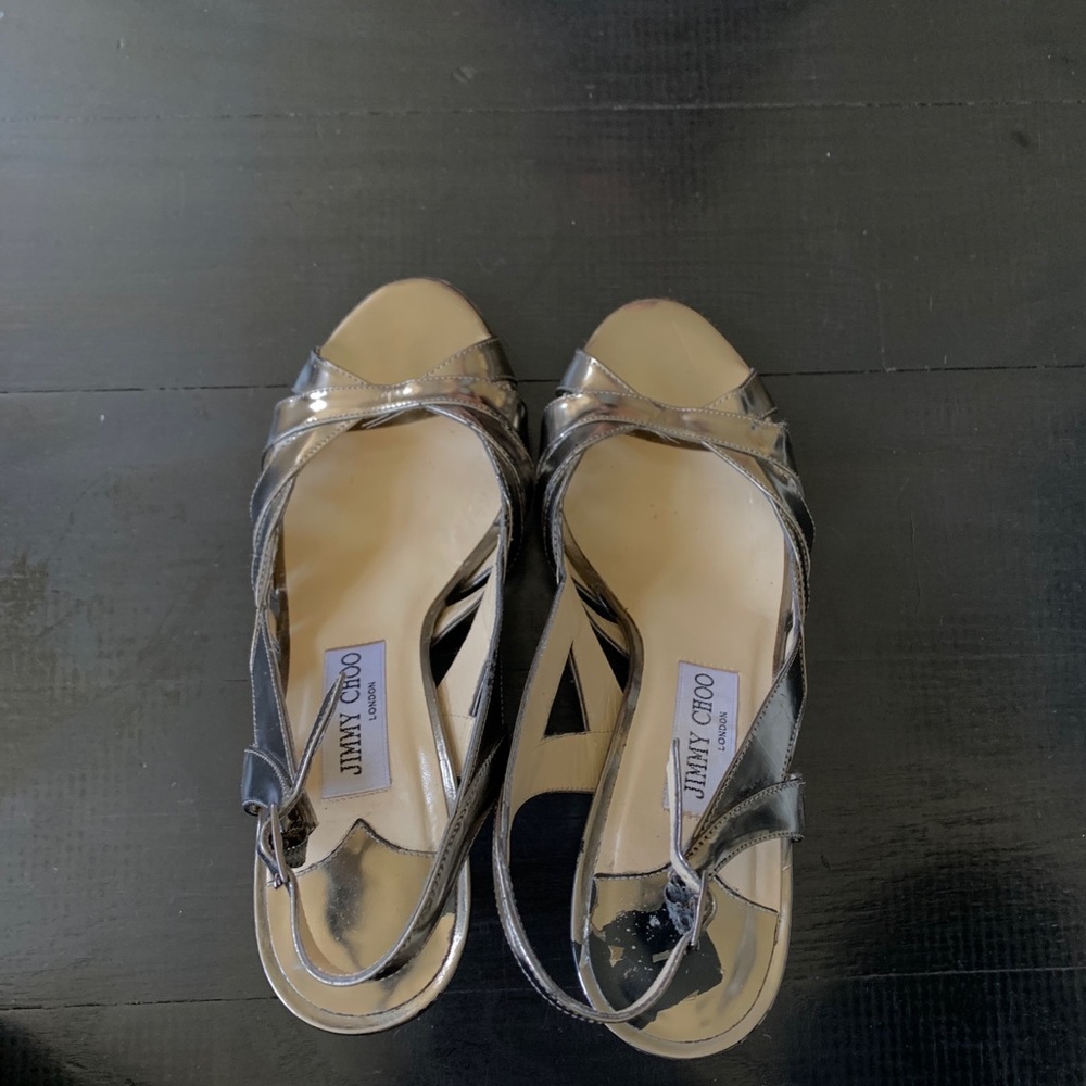 Jimmy Choo metallic open toe heels.